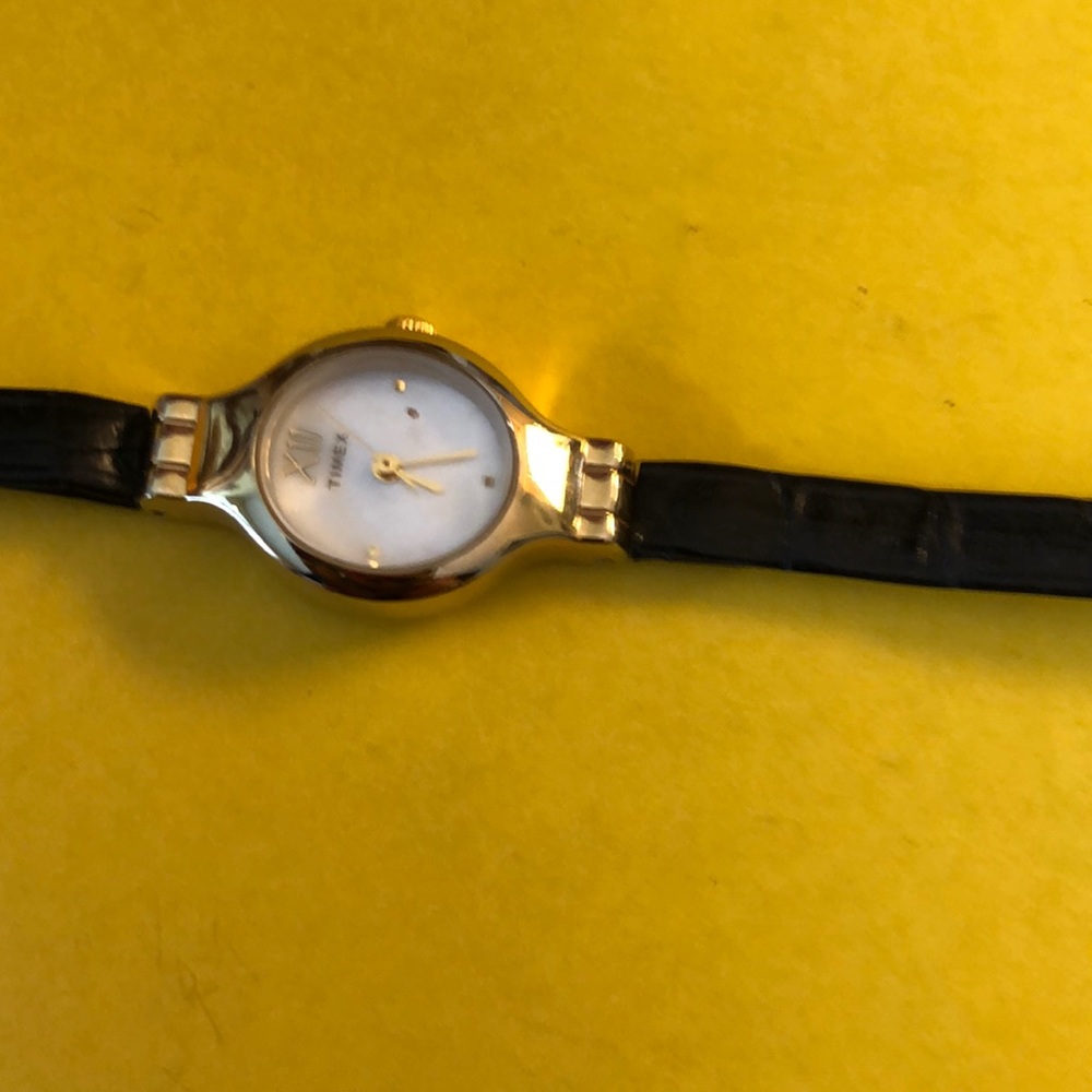 Timex gold and black leather feminine watch